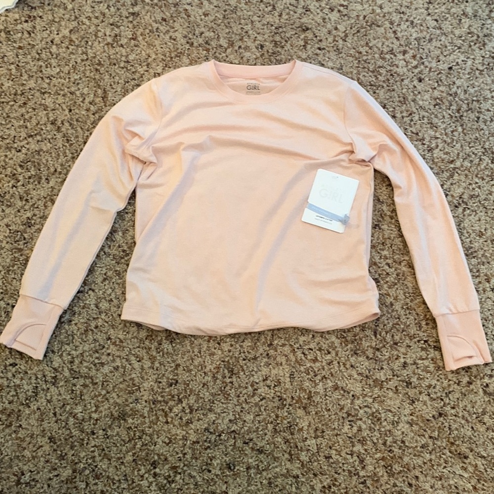 Really pretty light pink long sleeve shirt and all girls will love it